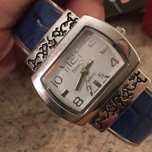 Beautiful watch with faux blue crocodile band.